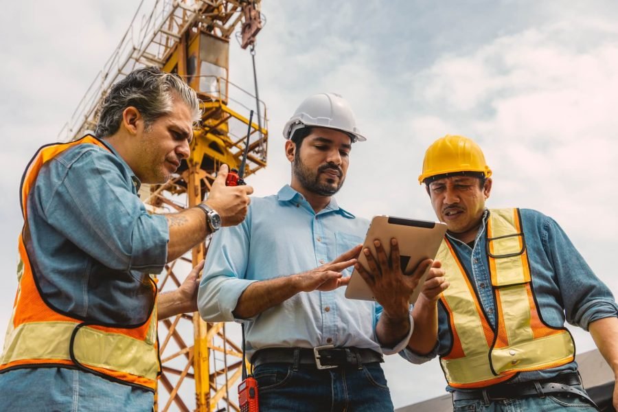 workers-team-working-together-with-contractor-at-construction-site-engineer-project-teamwork.jpg